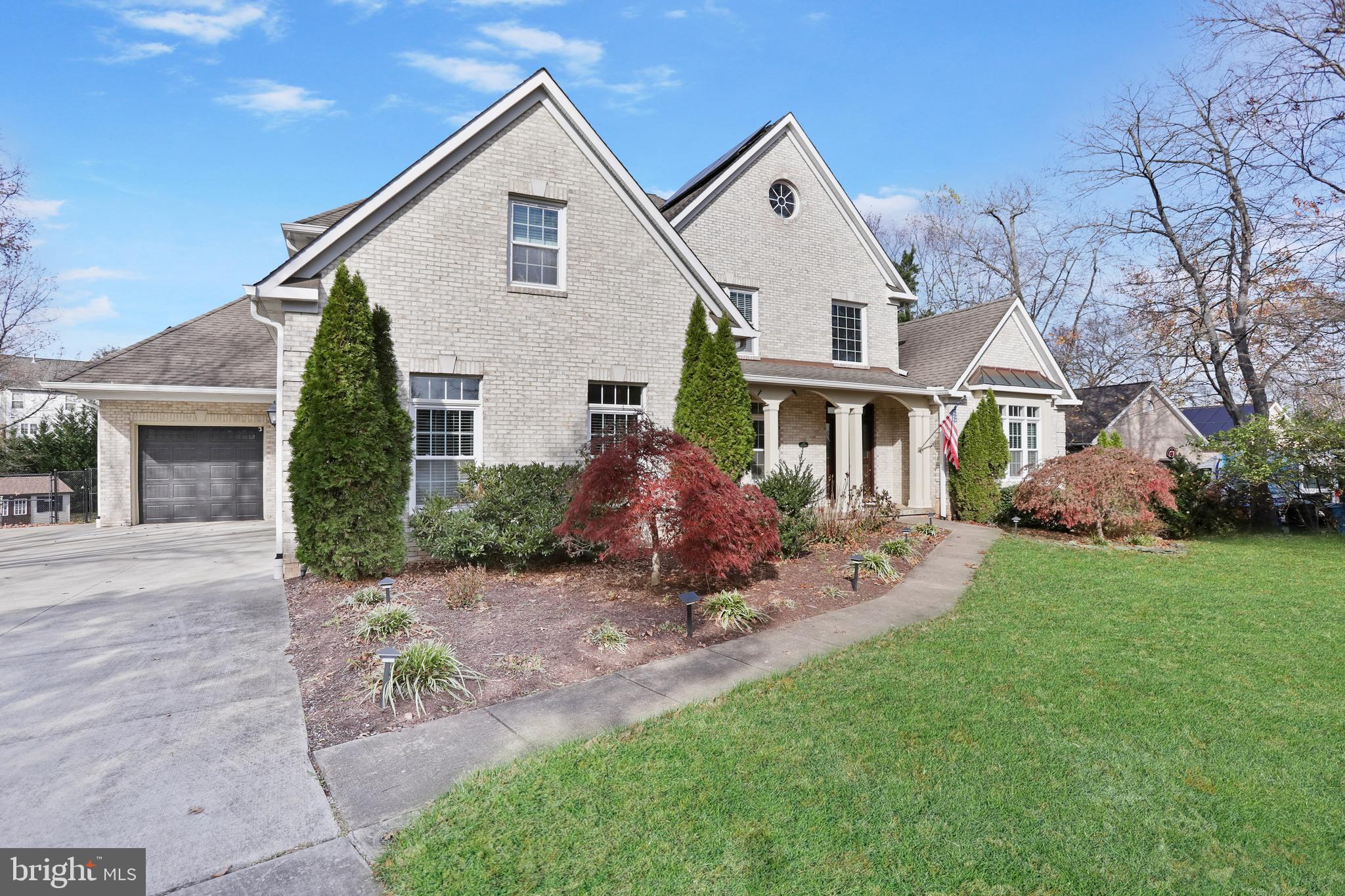 21490 Cedar Drive Sterling, VA 20164 - Photo 71 of 73 a front view of a house with yard and green space