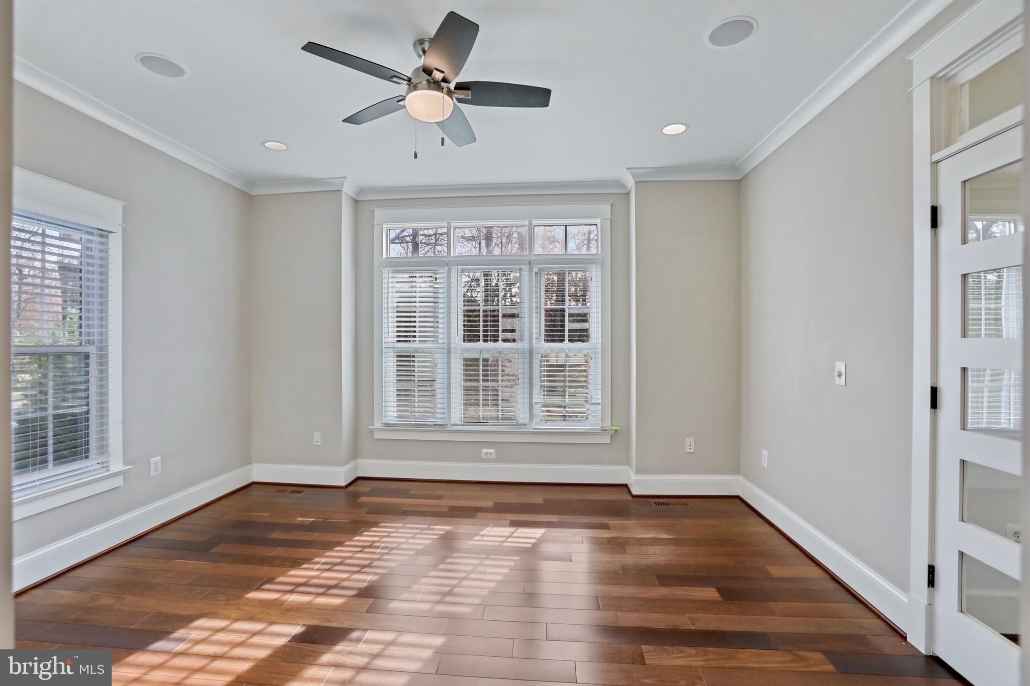 21490 Cedar Drive Sterling, VA 20164 - Photo 8 of 73 a view of empty room with wooden floor and fan