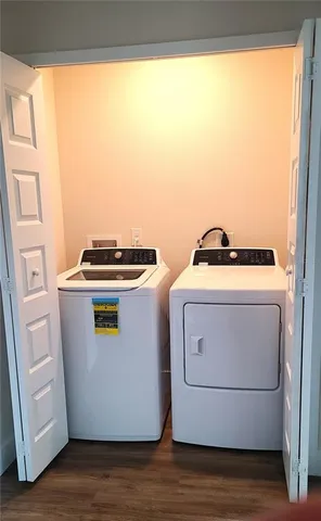 a utility room with washer and dryer