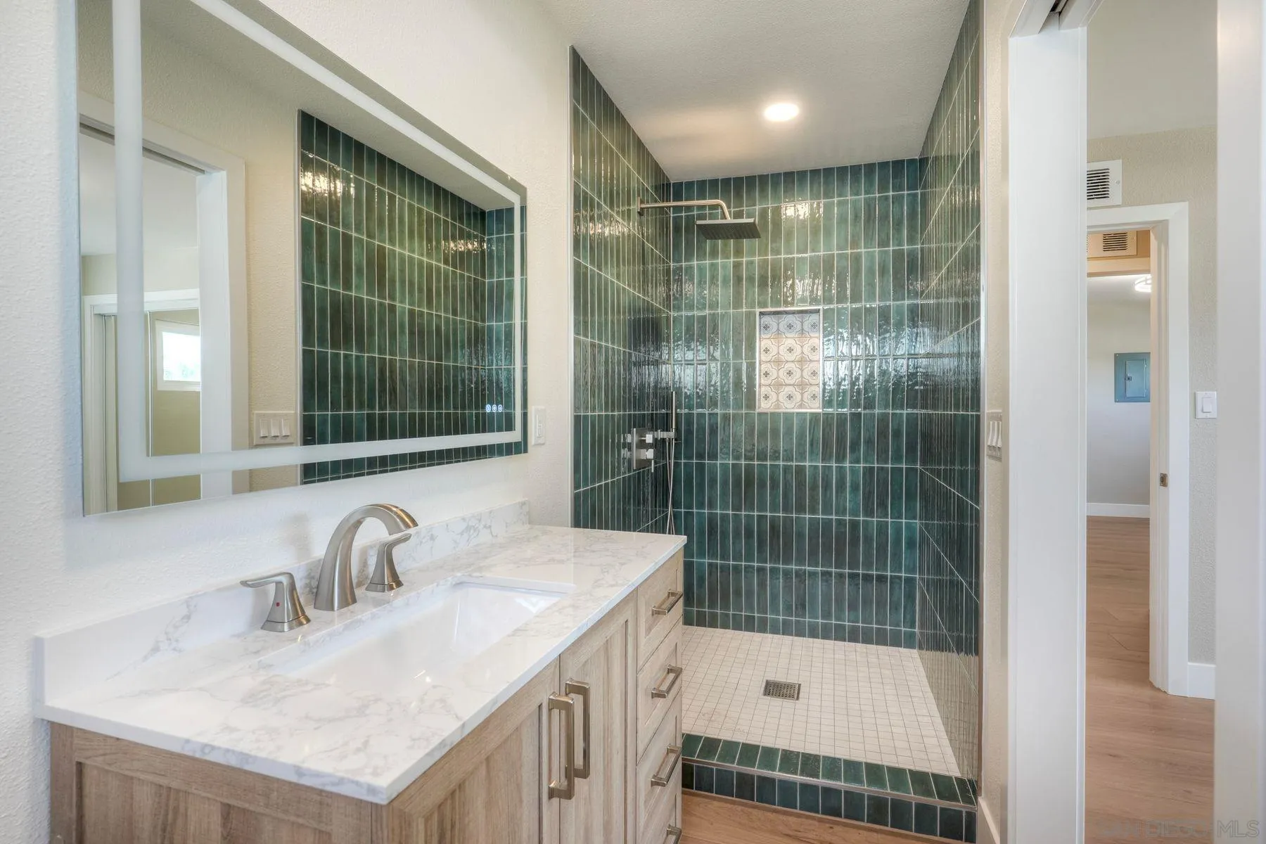 578 East Indian Rock Road Vista, CA 92084 - Photo 16 of 30 a bathroom with a sink a toilet and shower