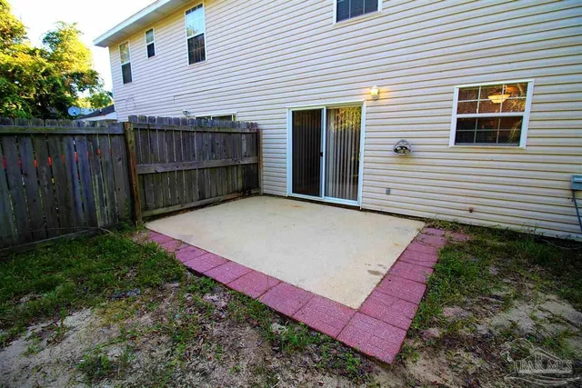 a view of a backyard with a deck