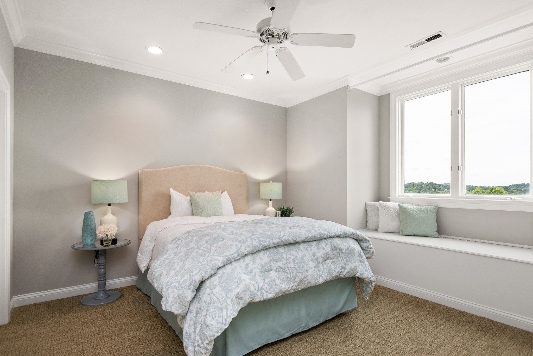 697 Legends Crest Drive Franklin, TN 37069 - Photo 14 of 26 a bedroom with a large bed and a chandelier