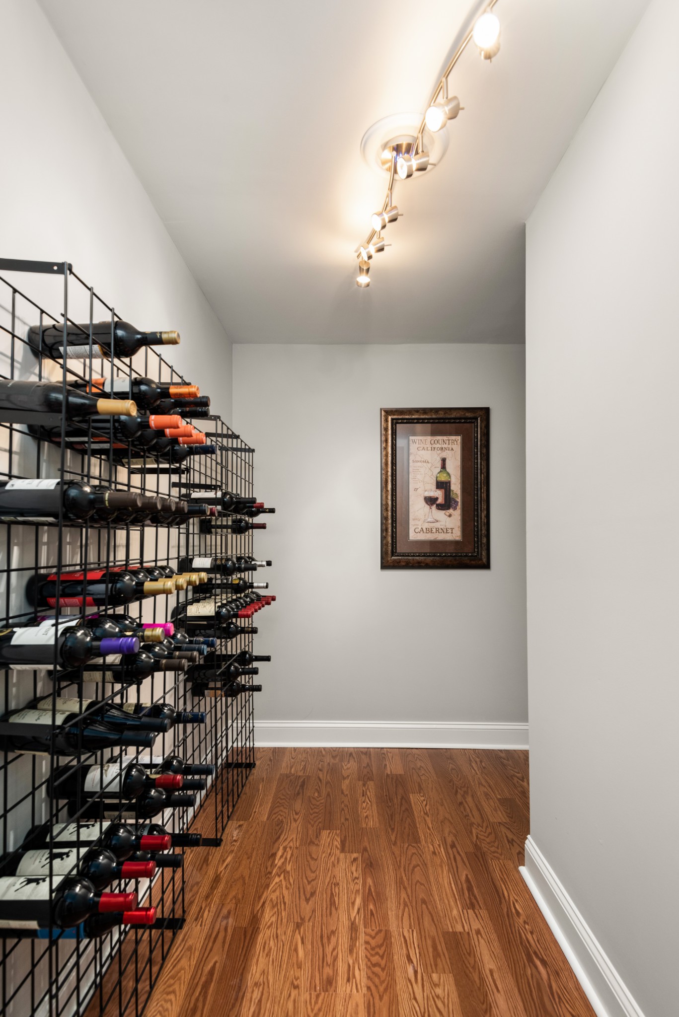 697 Legends Crest Drive Franklin, TN 37069 - Photo 20 of 26 a view of a hallway with wooden floor and entryway