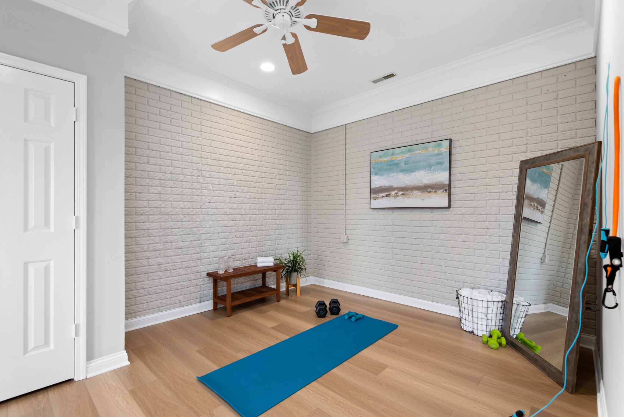 697 Legends Crest Drive Franklin, TN 37069 - Photo 21 of 26 a bedroom with furniture and a wooden floor