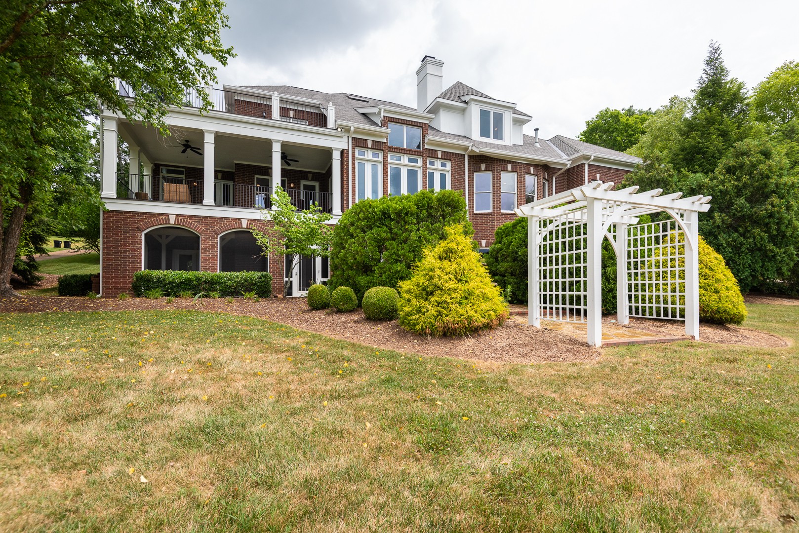 697 Legends Crest Drive Franklin, TN 37069 - Photo 24 of 26 a front view of a house with garden
