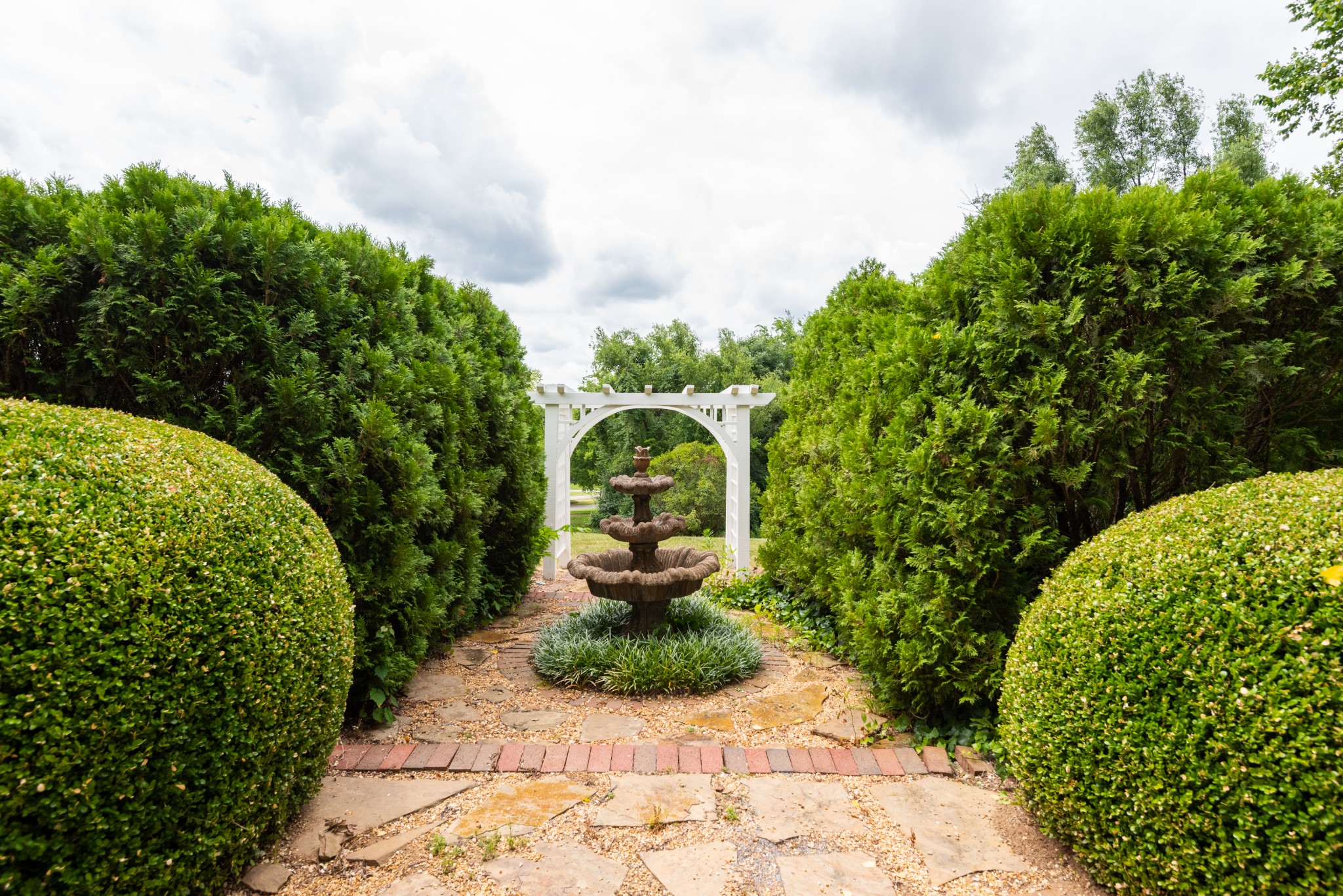 697 Legends Crest Drive Franklin, TN 37069 - Photo 25 of 26 a view of a garden with large trees