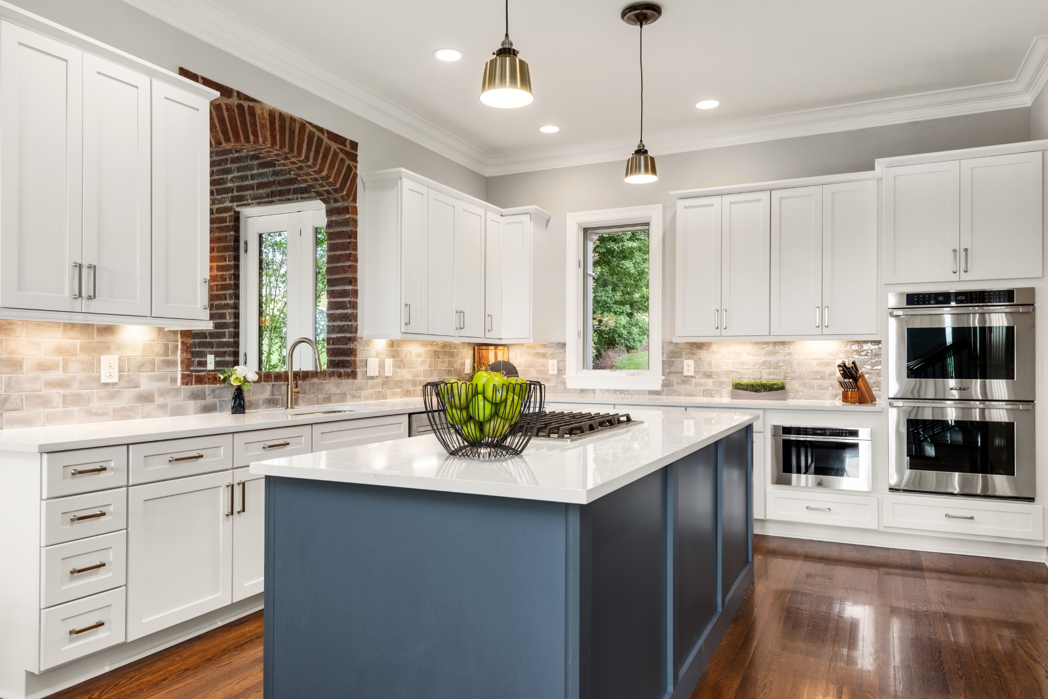 697 Legends Crest Drive Franklin, TN 37069 - Photo 7 of 26 a kitchen with a sink window and cabinets