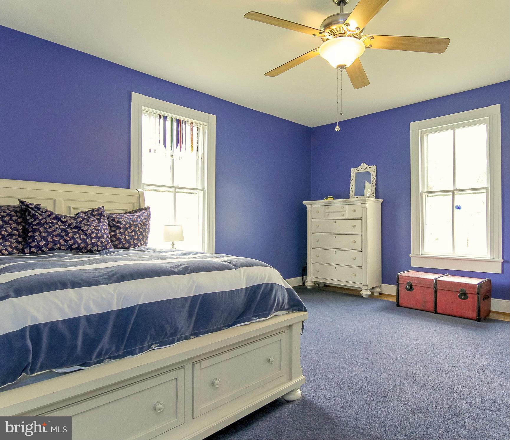8735 Monumental Mills Road Rixeyville, VA 22737 - Photo 16 of 25 a living room with furniture and a window