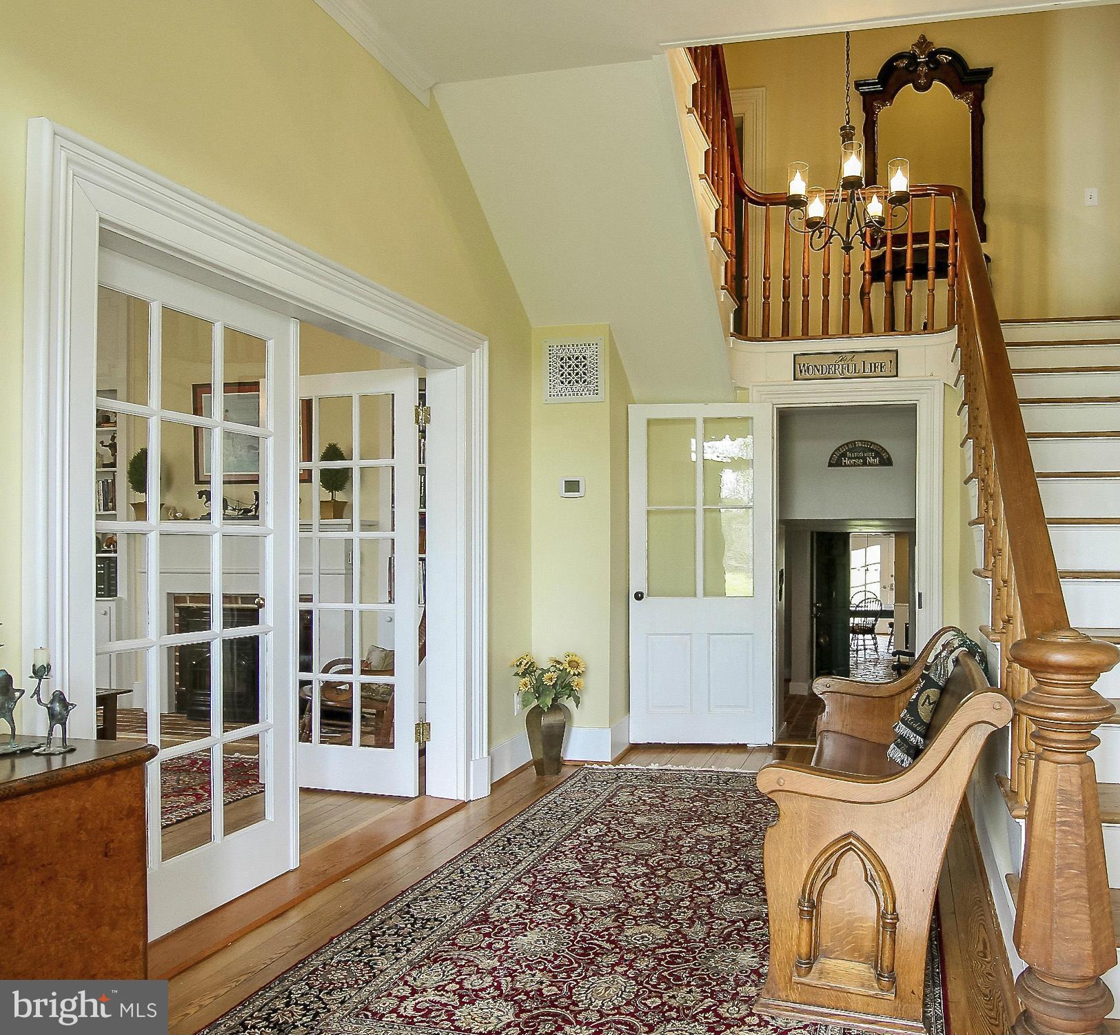 8735 Monumental Mills Road Rixeyville, VA 22737 - Photo 2 of 25 a view of a livingroom with furniture fire place and windows