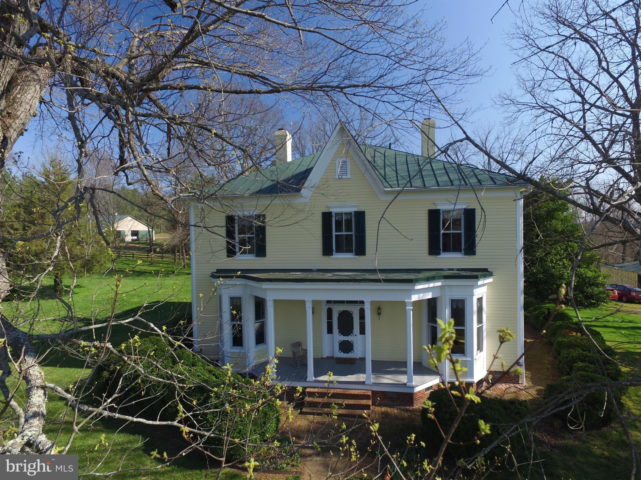 8735 Monumental Mills Road Rixeyville, VA 22737 - Photo 21 of 25 a front view of a house with garden