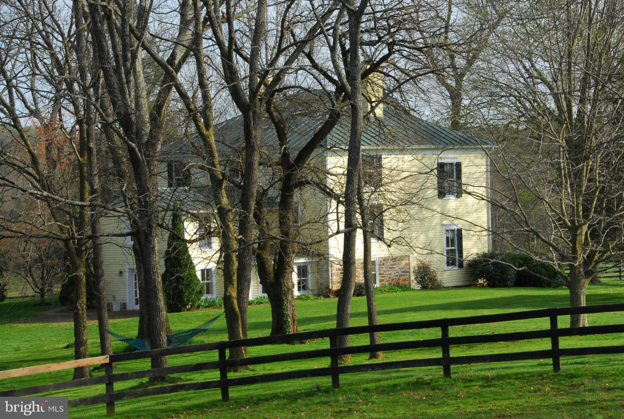 8735 Monumental Mills Road Rixeyville, VA 22737 - Photo 22 of 25 a front view of a house with a yard