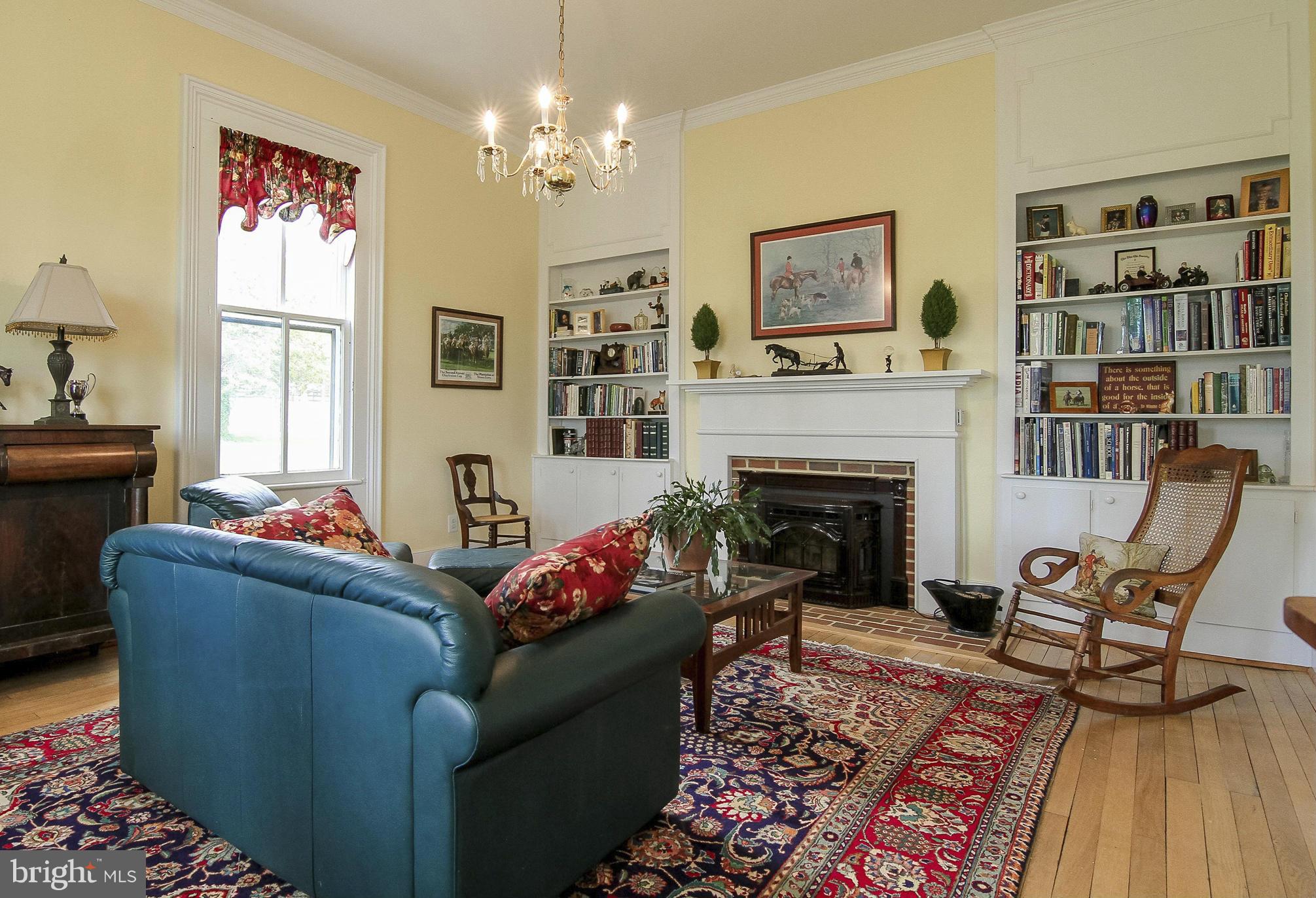 8735 Monumental Mills Road Rixeyville, VA 22737 - Photo 5 of 25 a living room with furniture and a fireplace