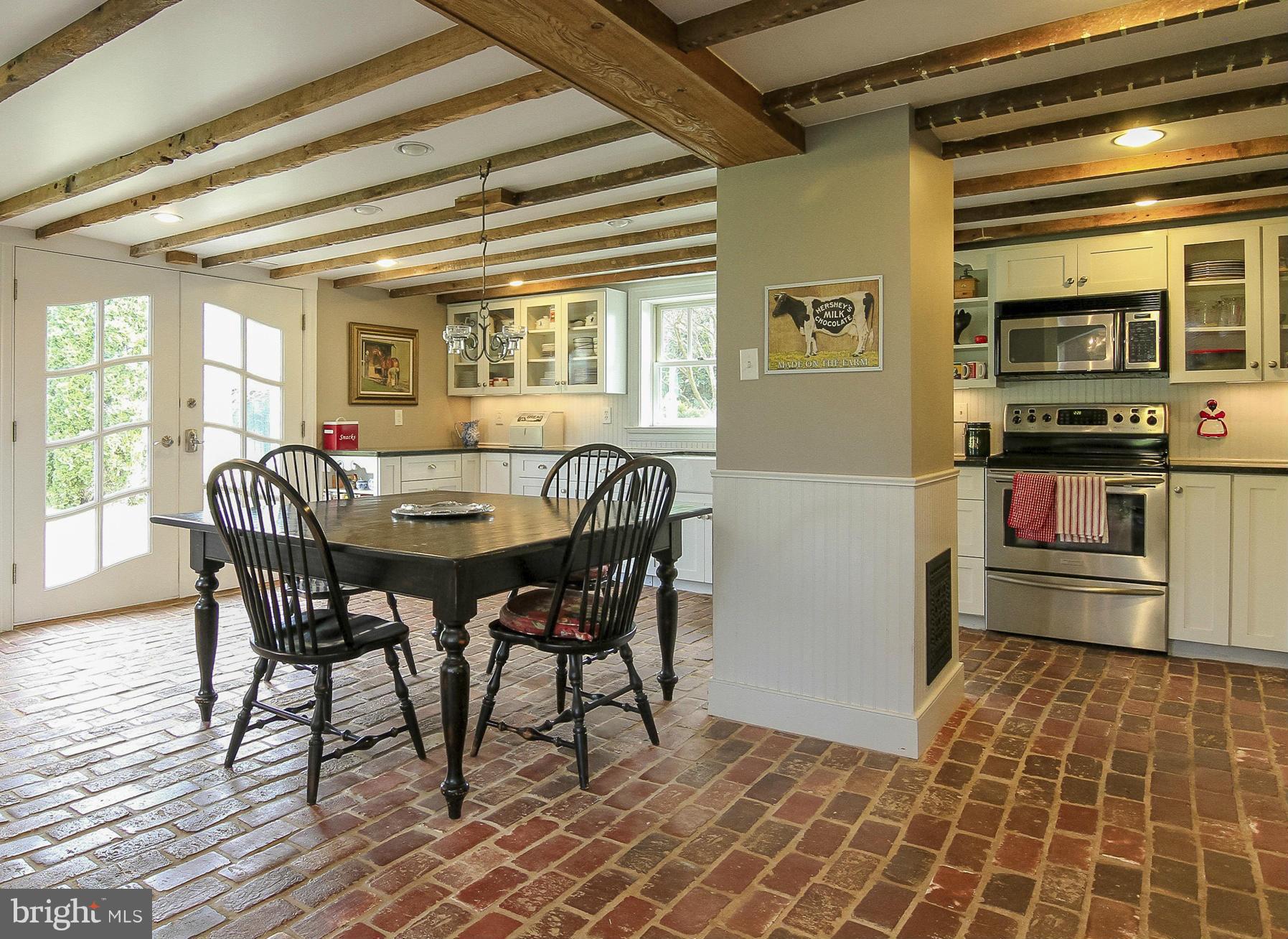 8735 Monumental Mills Road Rixeyville, VA 22737 - Photo 7 of 25 a dining room with furniture and window