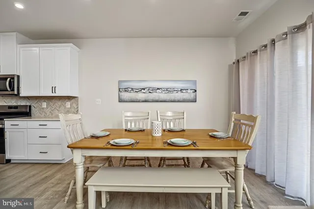 a view of a dining room with furniture