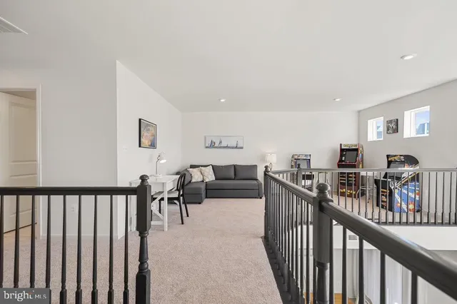 a view of a living room and balcony