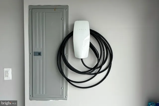 a view of staircase with washer and dryer