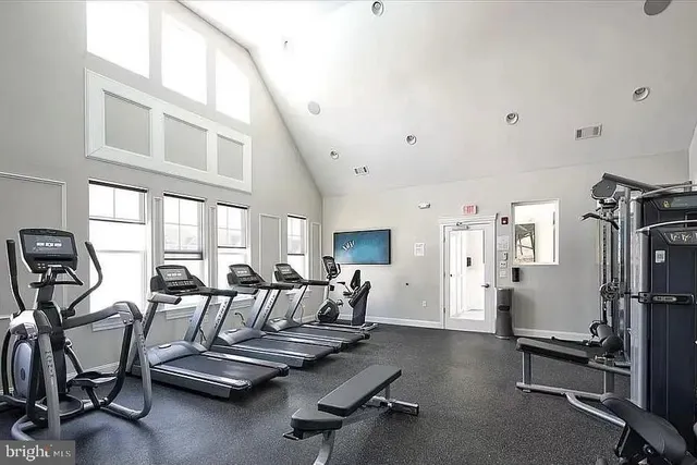 a view of a patio with couches table and chairs