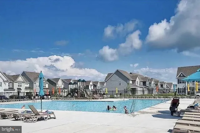 an aerial view of a house with a ocean view