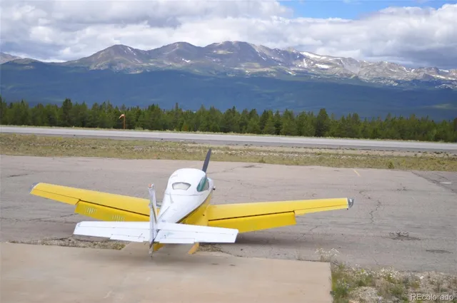 a view of outdoor space with signage and flags