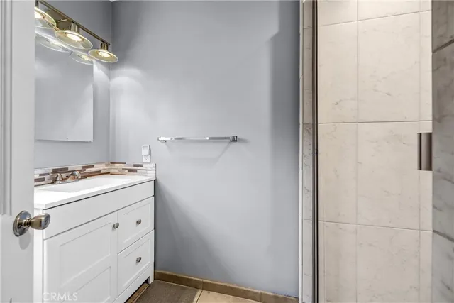 a view of a storage and utility room with closet