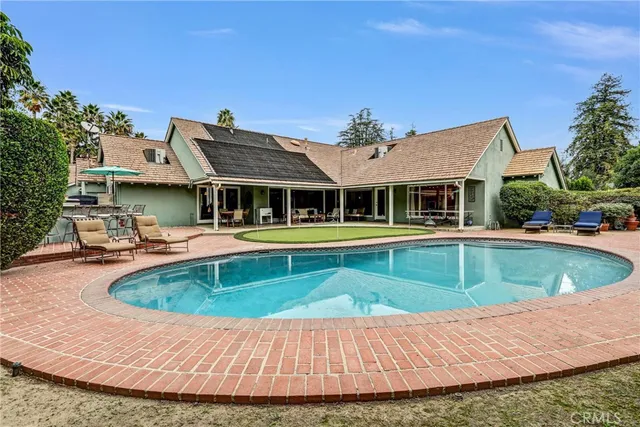 a view of outdoor space yard and swimming pool