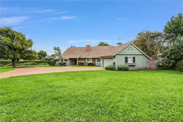 a view of a house with a big yard