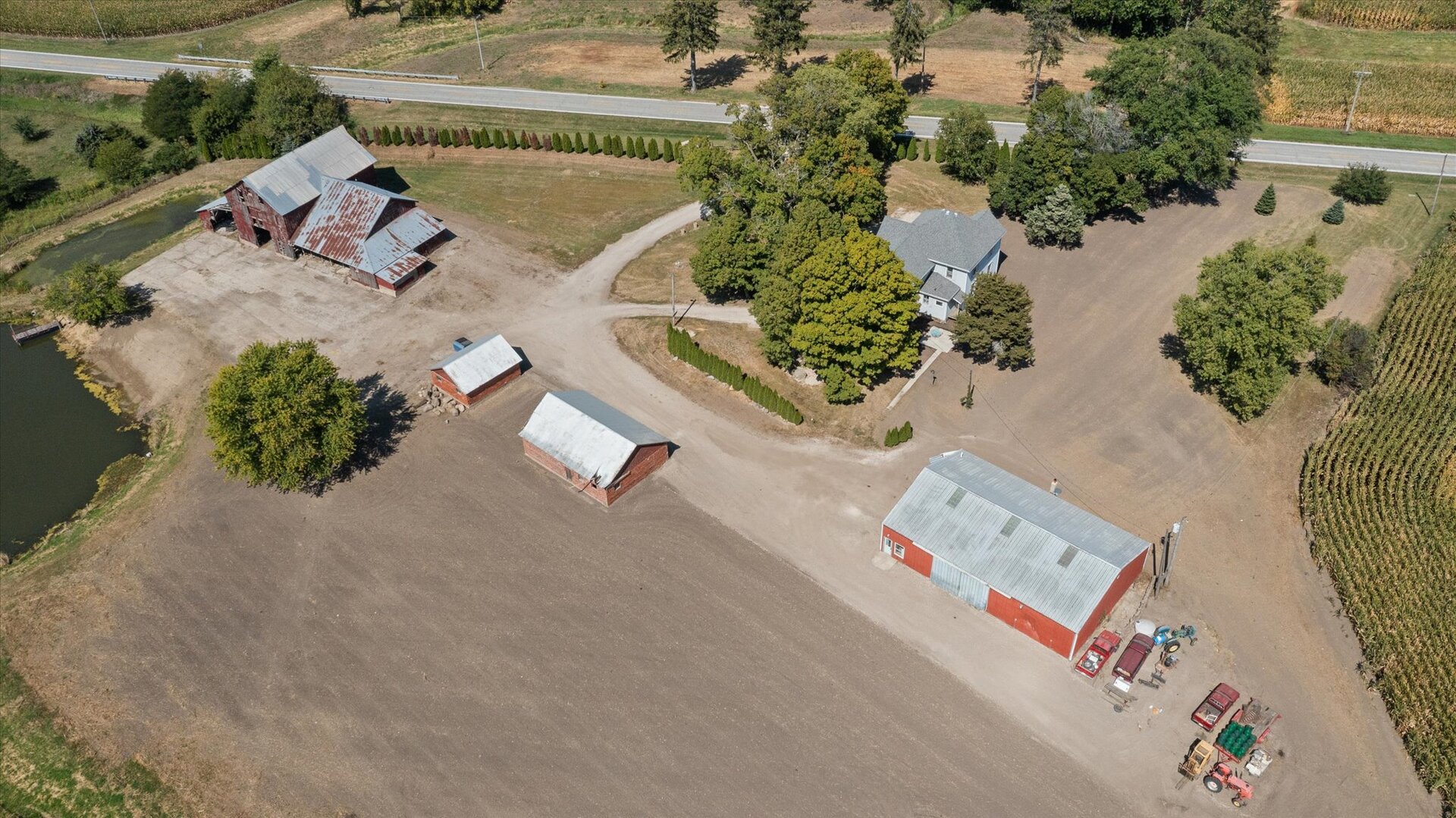 954 North 2401st Road Ottawa, IL 61350 - Photo 64 of 65 an aerial view of a house with a yard and lake view