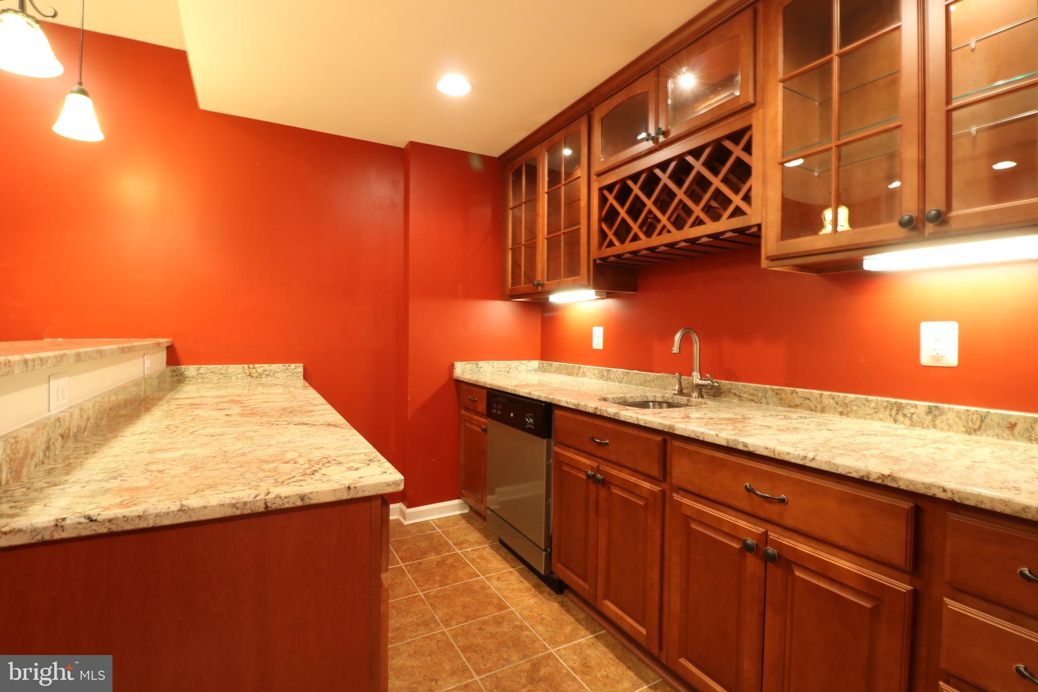 25497 Carrington Drive Chantilly, VA 20152 - Photo 34 of 41 a bathroom with a granite countertop sink and a mirror