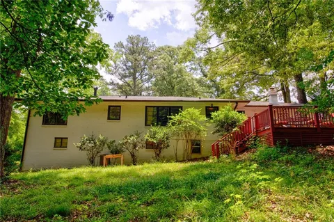 front view of a house with a big yard