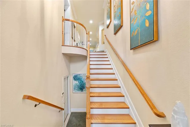 a view of staircase with white walls and white walls