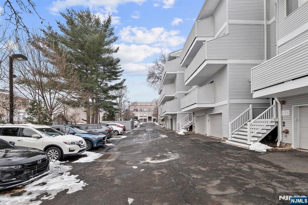 142 Main Avenue, Unit 4A Passaic, NJ 07055 - Photo 25 of 26 a view of a street with cars