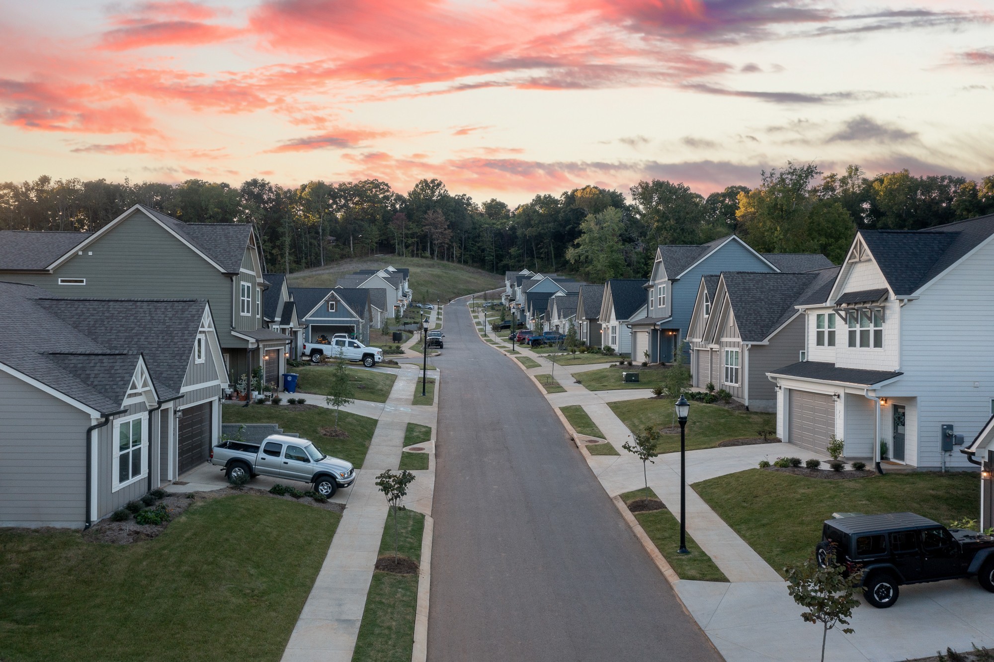a view of a house next to a yard