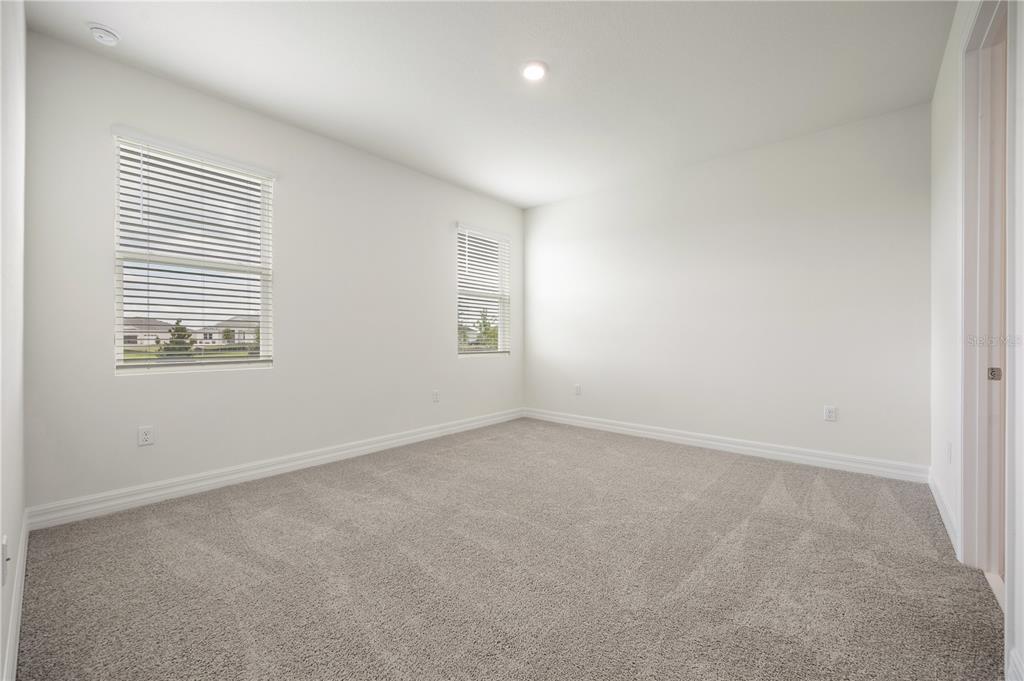 3944 Kennebunk Loop Mount Dora, FL 32757 - Photo 18 of 32 an empty room with a window