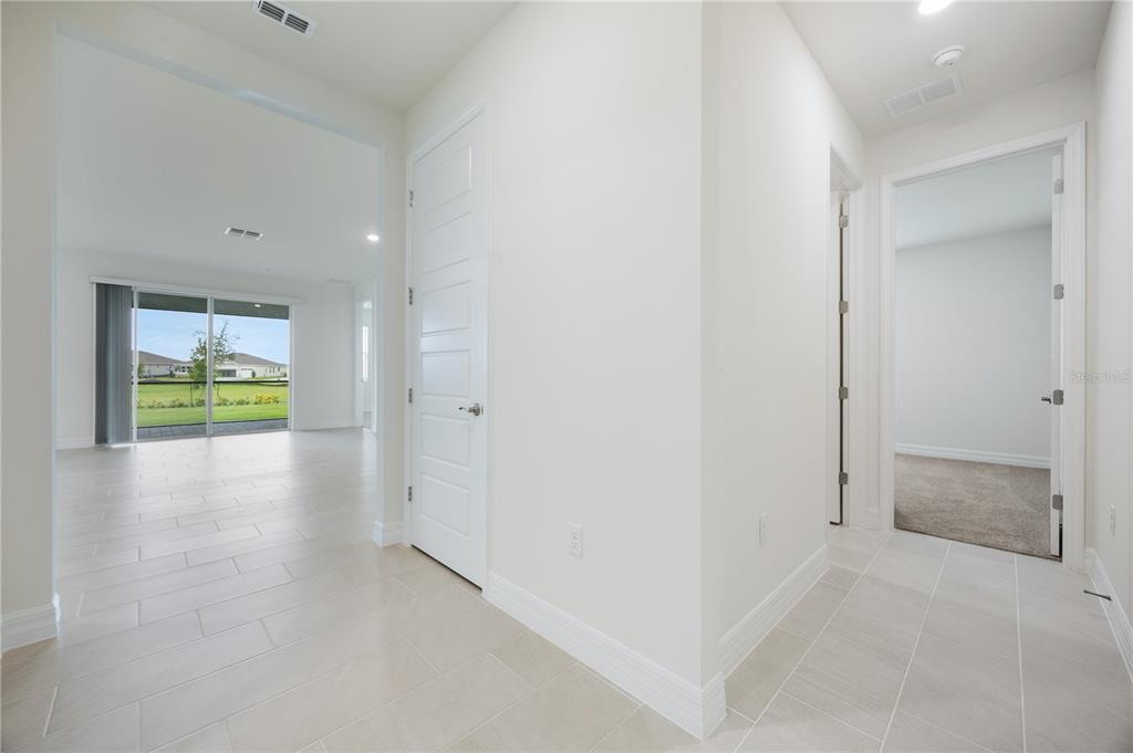 3944 Kennebunk Loop Mount Dora, FL 32757 - Photo 2 of 32 a view of an empty room with a window