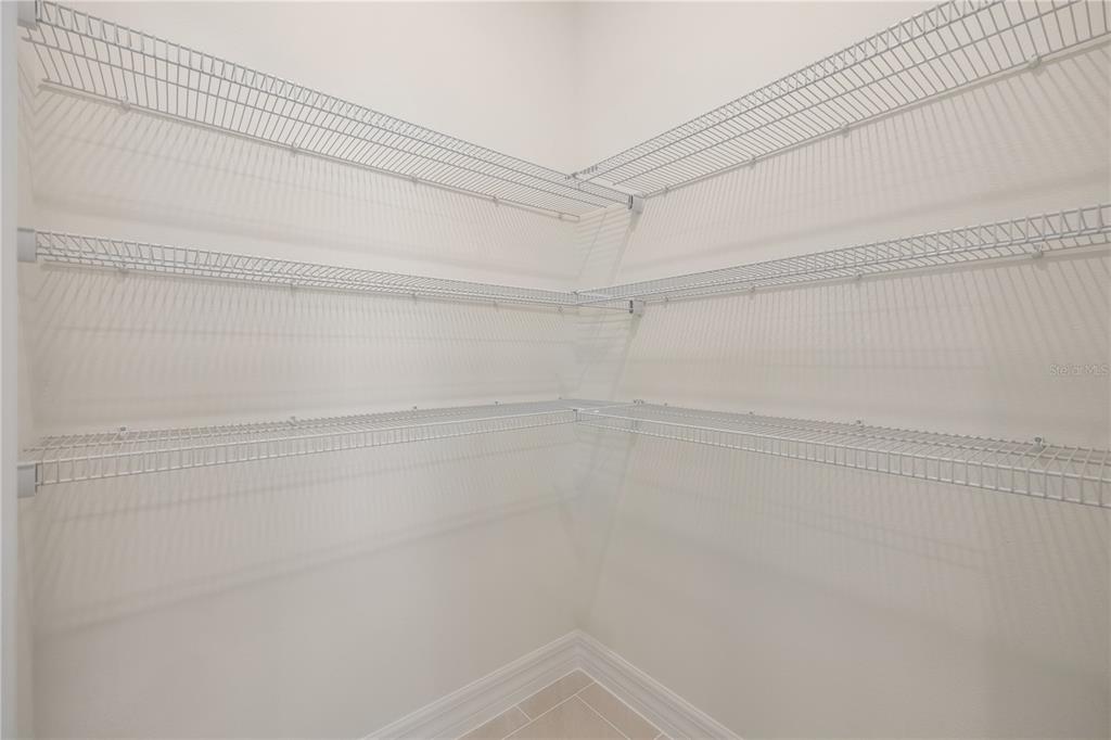 3944 Kennebunk Loop Mount Dora, FL 32757 - Photo 24 of 32 a view of a room with shelf