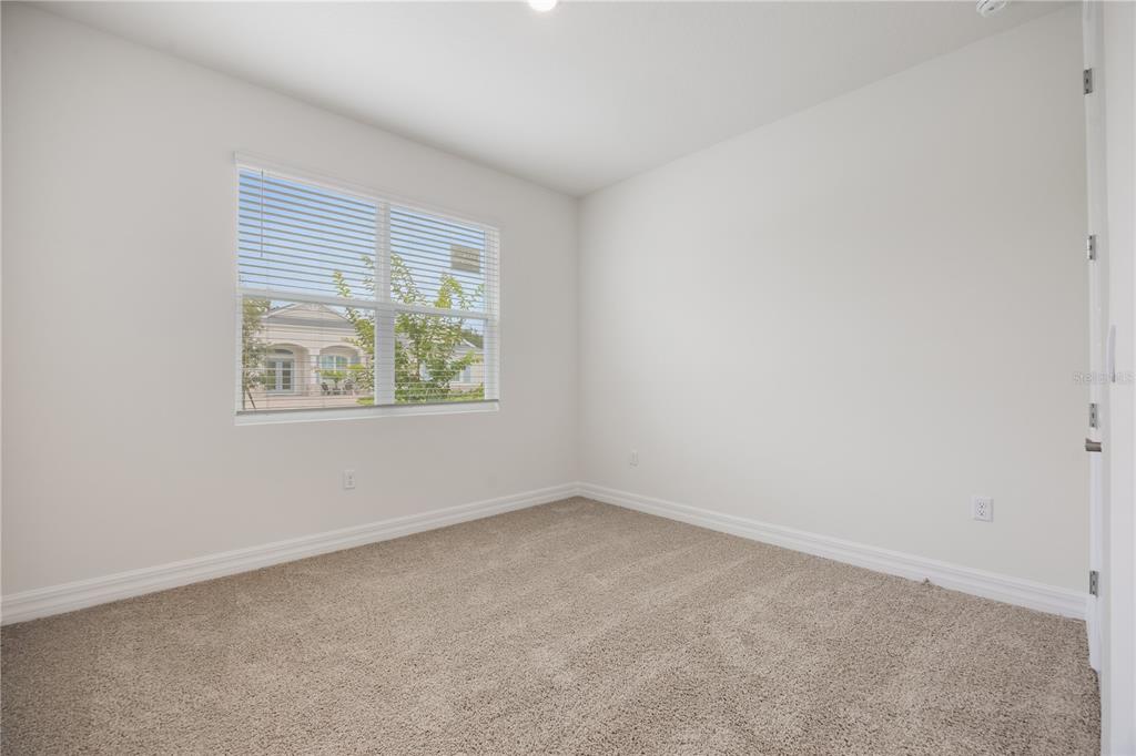 3944 Kennebunk Loop Mount Dora, FL 32757 - Photo 27 of 32 an empty room with windows