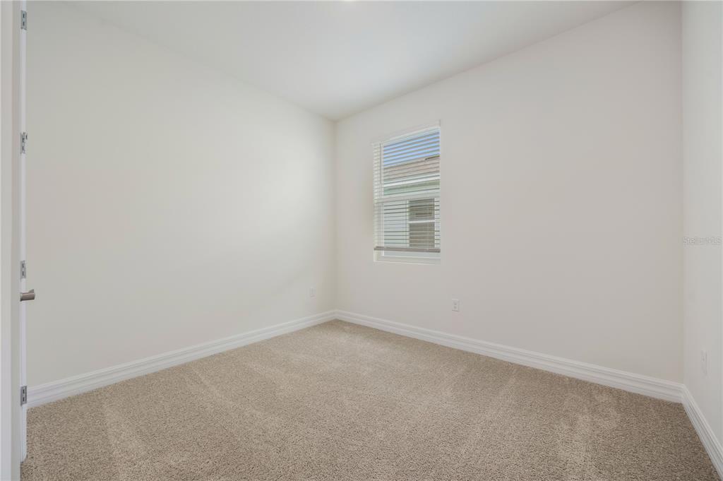 3944 Kennebunk Loop Mount Dora, FL 32757 - Photo 30 of 32 an empty room with a window