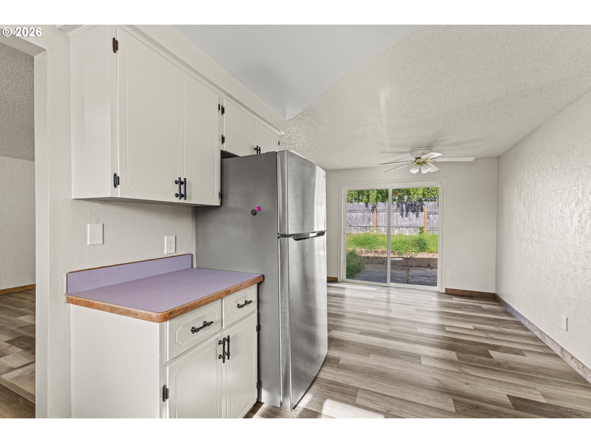 1816 Sunset Court Myrtle Point, OR 97458 - Photo 13 of 42 a kitchen with stainless steel appliances granite countertop a sink stove and refrigerator