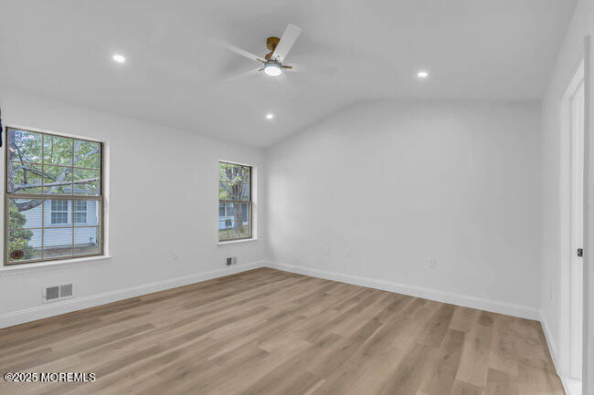11 Sedgwick Square Jackson, NJ 08527 - Photo 11 of 19 wooden floor in an empty room with a window