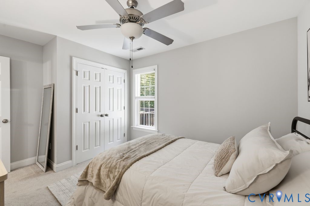 222 Oak Ridge Court Aylett, VA 23009 - Photo 26 of 35 Neutral gray walls complement the light-toned carp