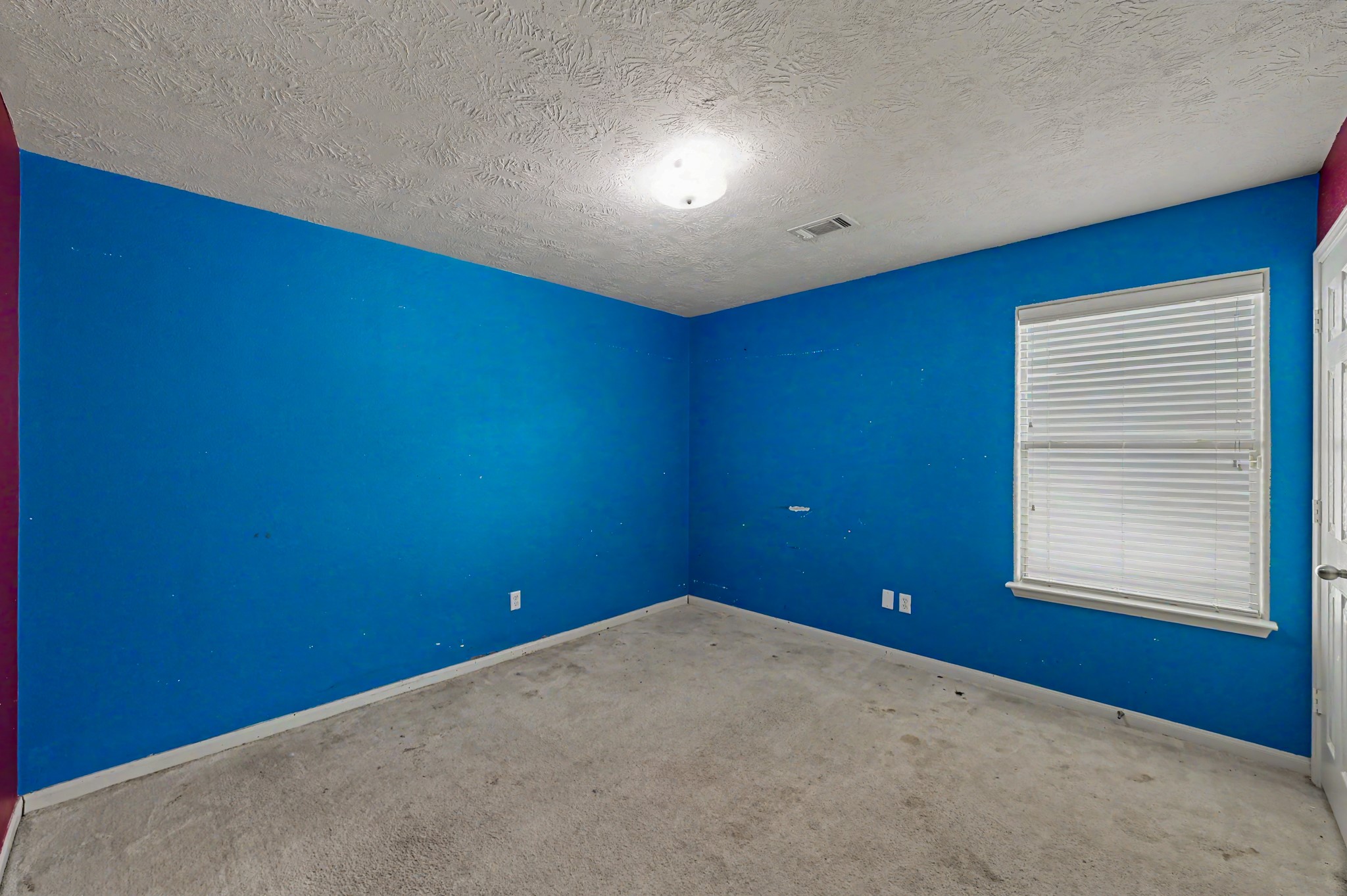 4619 Comal River Loop Spring, TX 77386 - Photo 7 of 16 Just up the hallway is the first of 2 spacious secondary bedrooms each with walk in closets.