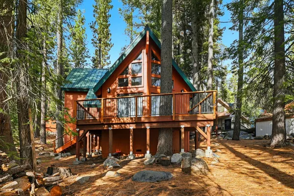 a view of a house with roof deck