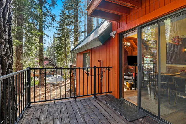 a view of balcony with wooden floor and outdoor space