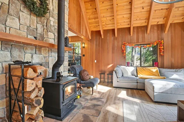a view of balcony with couch and chairs