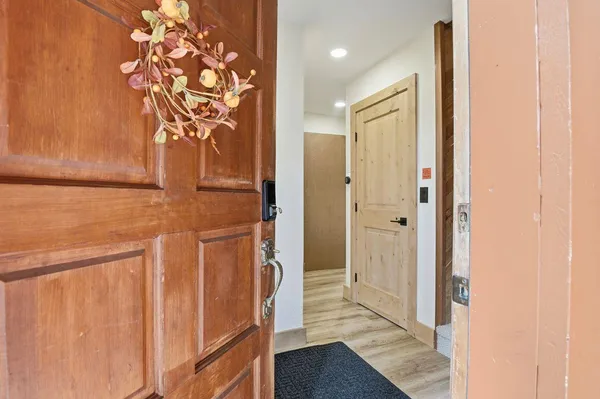 a bathroom with a granite countertop shower and a sink