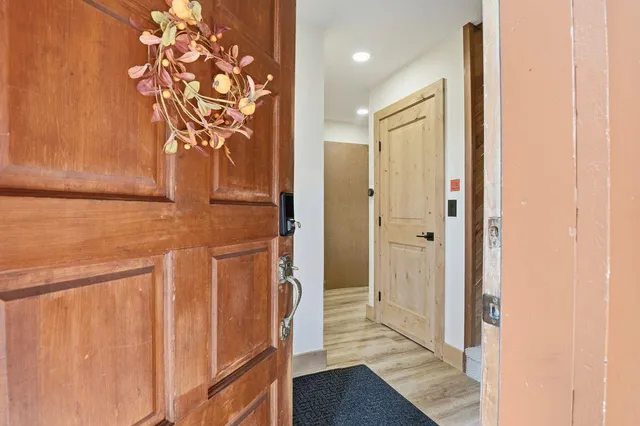 a bathroom with a granite countertop shower and a sink