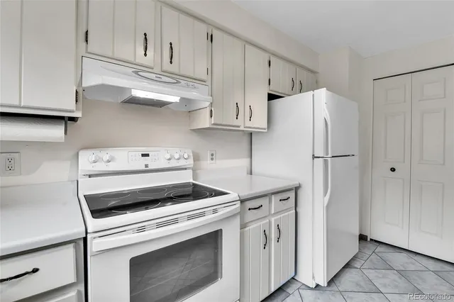 a view of an empty room with glass door