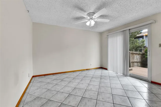 a kitchen with a stove a sink and a refrigerator
