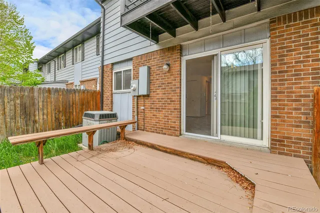 a backyard of a house with seating space