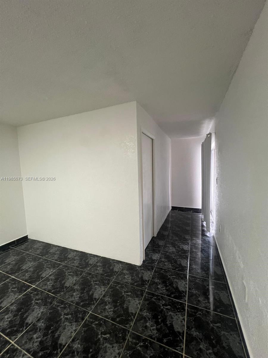 1900 West 68th Street, Unit D207 Hialeah, FL 33014 - Photo 32 of 33 a view of car garage